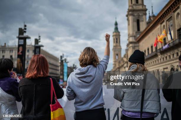 Hundreds of women gather in the Plaza of the Basilica del Pilar of Zaragoza to celebrate to celebrate March 8, International Women's Day, Spain