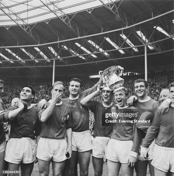 Manchester United players after winning the 1963 FA Cup Final against Leicester City at Wembley Stadium in London, UK, 25th May 1963. United won 3-1....