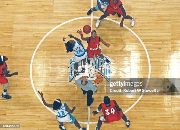 High-angle view of the tip at the American Basketball League's first game, between the New England Blizzard and the Richmond Rage, Hartford,...