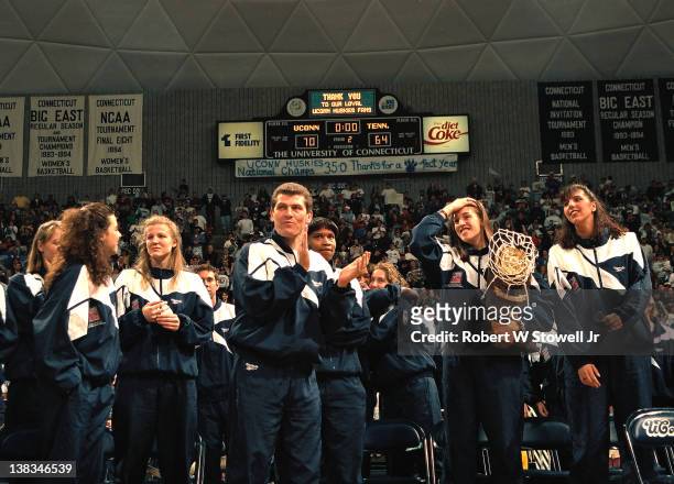 Members of the University of Connecticut women's basketball team celebrate at a pep rally in their honor following their victory at the 1995 National...