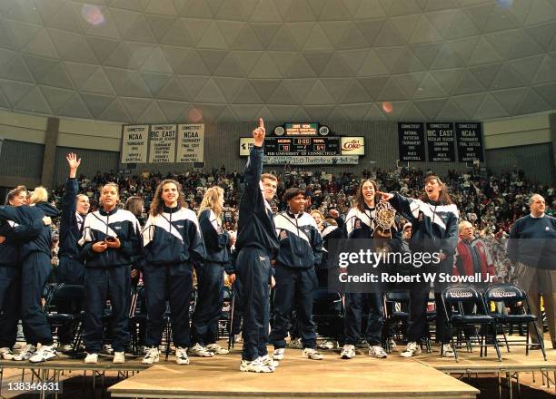 Members of the University of Connecticut women's basketball team celebrate at a pep rally in their honor following their victory at the 1995 National...