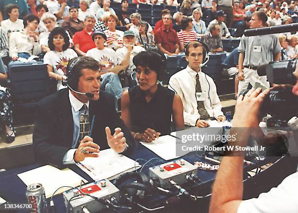 Network commentator Robin Roberts and Italian-born American basketball coach Geno Auriemma of the University of Connecticut broadcast an exhibition...