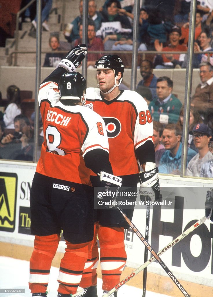 Eric Lindross And Mark Recchi Celebrate