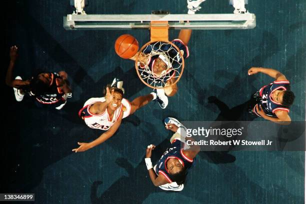 Above the hoop view of action during the American Basketball League All-Star game, Hartford, Connecticut, 1997. Among those pictured are Western...