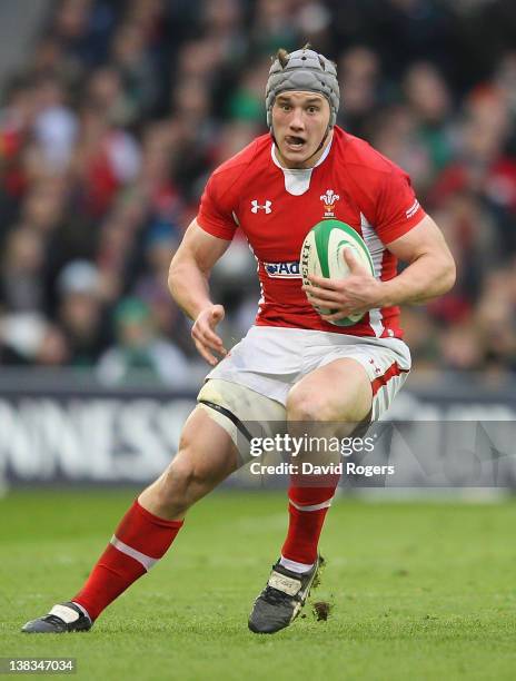 Jonathan Davies of Wales runs with the ball during the RBS Six Nations match between Ireland and Wales on February 5, 2012 at the Aviva Stadium in...