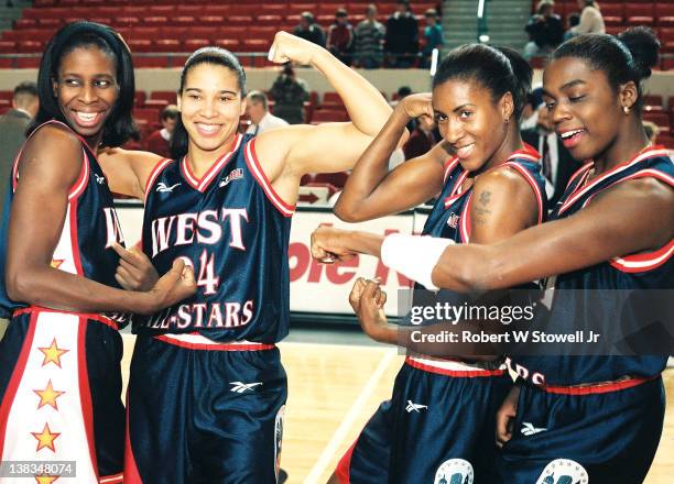 Members of the American Basketball League Western Conference's All-Star team show their muscles before the game, Hartford, Connecticut, December 15,...