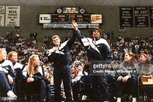 Italian-born American basketball coach Geno Auriemma of the University of Connecticut introduces player Jamelle Elliott at a pep rally in their honor...