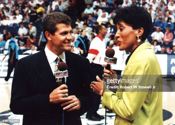 Network commentator Robin Roberts speaks with Italian-born American basketball coach Geno Auriemma of the University of Connecticut before an...