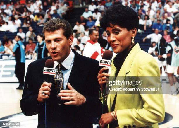 Network commentator Robin Roberts speaks with Italian-born American basketball coach Geno Auriemma of the University of Connecticut before an...