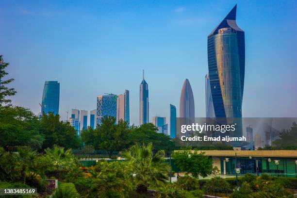 al shaheed park and skyscraper,  soor st, kuwait city, kuwait - kuwait landmark stock pictures, royalty-free photos & images