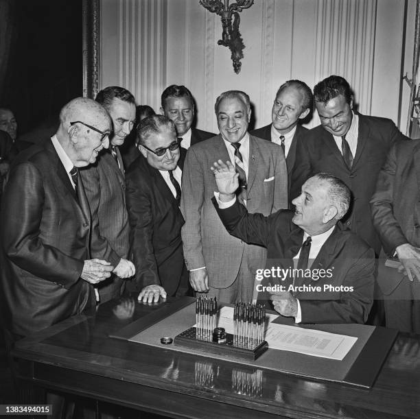 President Lyndon B. Johnson signs the NDEA Amendment in Washington, DC, USA, 16th October 1964.