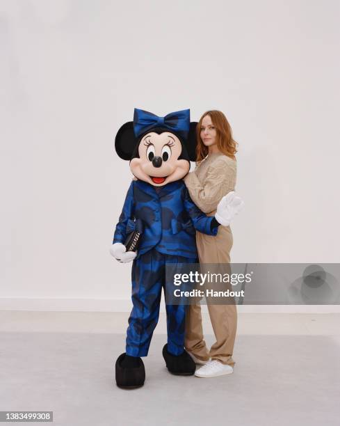 Minnie and Stella McCartney pose for Disneyland Paris 30th Anniversary celebrations at Disneyland Paris on March 05, 2022 in Paris, France.