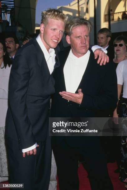 American actor Gary Busey and his son Jake Busey attend the premiere of the film 'The Frighteners' at the Cineplex Odeon in Universal City, Los...
