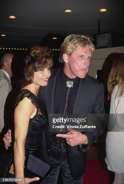 American actor Gary Busey and his date attend the premiere of the film 'Unforgiven' at the Mann Bruin Theatre in Westwood, California, USA, 3rd...