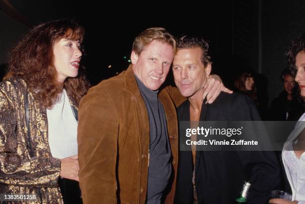 American actors Gary Busey and Mickey Rourke , USA, circa 1990.