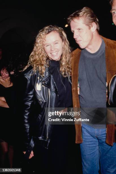 American actor Gary Busey and model Greta Blackburn, USA, circa 1990.