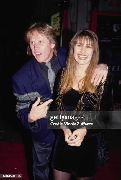 American actor Gary Busey and his date attend the premiere of the film 'Freejack' at the Mann's Chinese Theatre in Hollywood, California, USA, 16th...