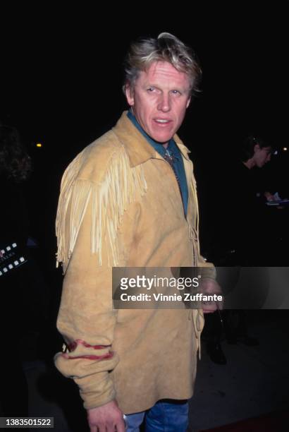American actor Gary Busey at the premiere of the film 'Dumb and Dumber' at the Cinerama Dome in Hollywood, California, USA, 6th December 1994.