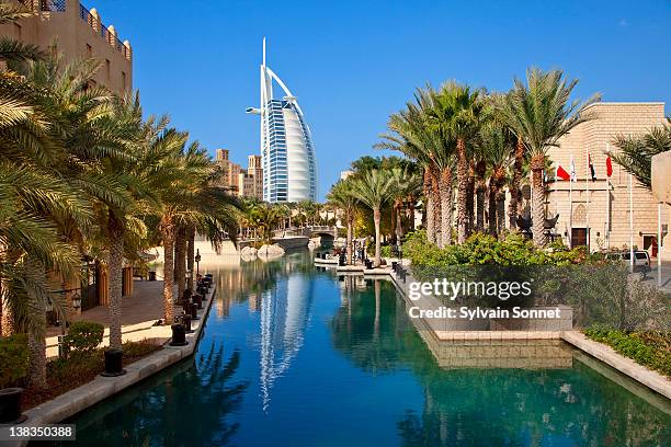 dubai, madinat jumeirah and the burj al arab hotel - dubai stockfoto's en -beelden