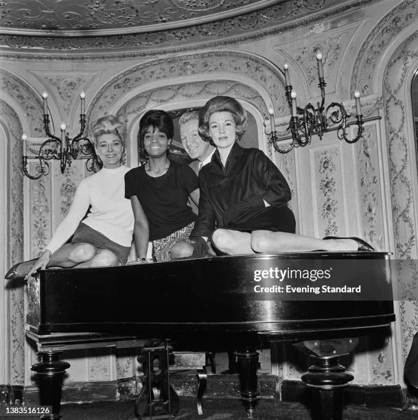 From left to right, actresses Hy Hazell , Beverly Todd, baritone singer Art Lund and actress Marti Stevens, stars of the musical 'No Strings',...