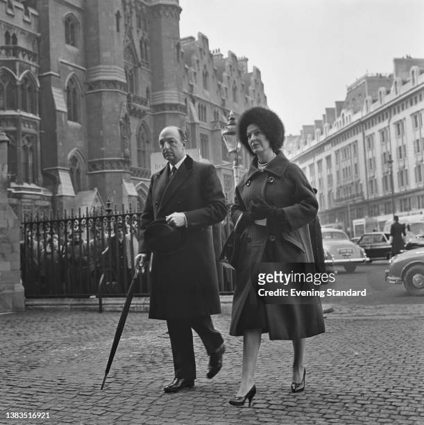 British Conservative politician John Profumo , the Secretary of State for War, and his wife, actress Valerie Hobson , attend a memorial service for...