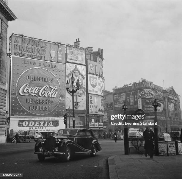 Piccadilly Circus in London, at the end of Regent Street, UK, 16th January 1963.