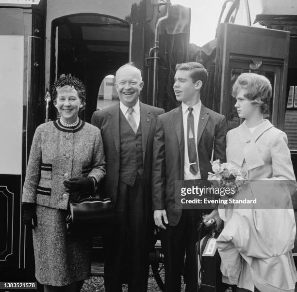 Former US President Dwight D. Eisenhower and his wife Mamie with their grandchildren Dwight David and Barbara Anne Eisenhower at St Pancras Station...