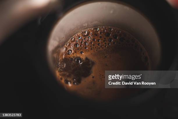 close up of a fresh brew of organic coffee. - macro food stock pictures, royalty-free photos & images