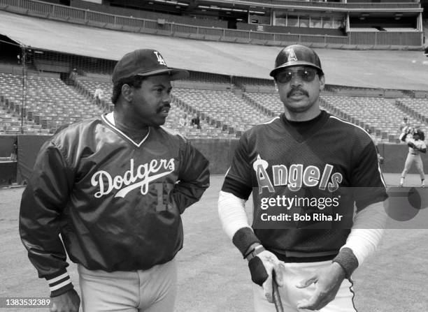 Reggie Jackson and Bill Madlock enjoy a pregame chat before game of Los Angeles Dodgers and California Angels, April 6, 1986 in Anaheim, California.