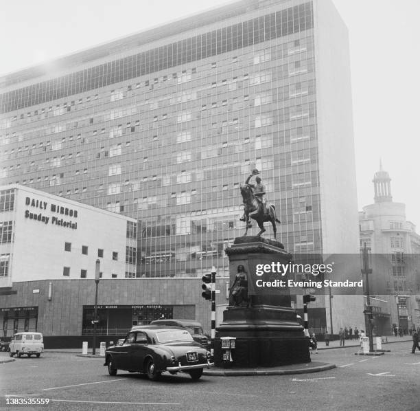 An 1874 equestrian statue of Prince Albert by Charles Bacon at Holborn Circus in the City of London, UK, 11th October 1962. On the left are the...