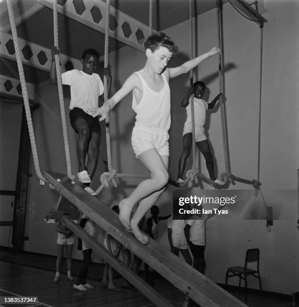 Pupils in the gymnasium of Tulse Hill School, a comprehensive school for boys in Lambeth, London, UK, July 1968.