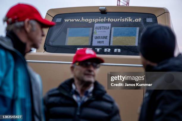 Bus driver from Austria waits for refugees fleeing Ukraine at the Western Railway Station on March 9, 2022 in Budapest, Hungary. More than 2 million...