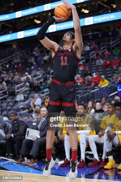 Jaiden Delaire of the Stanford Cardinal shoots the corner three against Arizona State Sun Devils during the first round of the Pac-12 Conference...