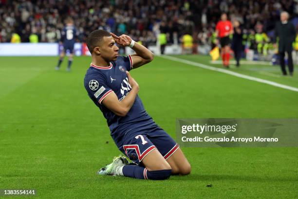 Kylian Mbappe of Paris Saint-Germain celebrates after scoring their team's first goal during the UEFA Champions League Round Of Sixteen Leg Two match...