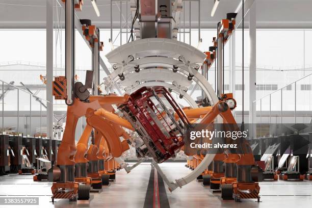 renderizado 3d de robots industriales en la línea de montaje de la fábrica automática de fabricación de automóviles - car manufacturing fotografías e imágenes de stock