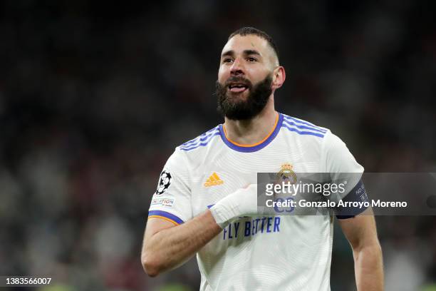 Karim Benzema of Real Madrid celebrates after scoring their team's second goal during the UEFA Champions League Round Of Sixteen Leg Two match...