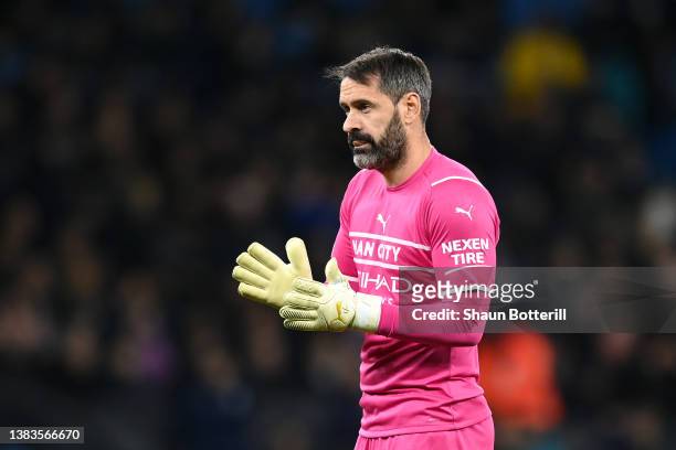 Scott Carson of Manchester City looks on during the UEFA Champions League Round Of Sixteen Leg Two match between Manchester City and Sporting CP at...