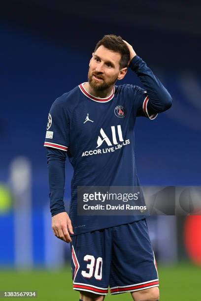 Lionel Messi of Paris Saint-Germain looks dejected during the UEFA Champions League Round Of Sixteen Leg Two match between Real Madrid and Paris...