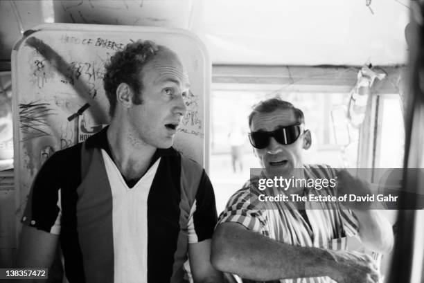 Author Ken Kesey and Beat legend Neal Cassady onboard the legendary Merry Pranksters' Day-Glo Bus in June 1964 in New York City, New York.