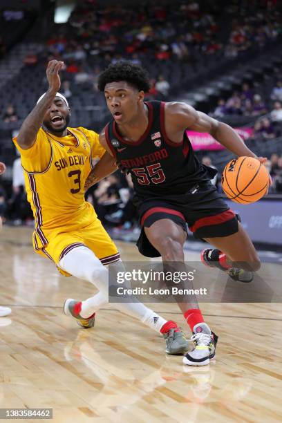 Harrison Ingram of the Stanford Cardinal handles the ball against Marreon Jackson of the Arizona State Sun Devils during the first round of the...