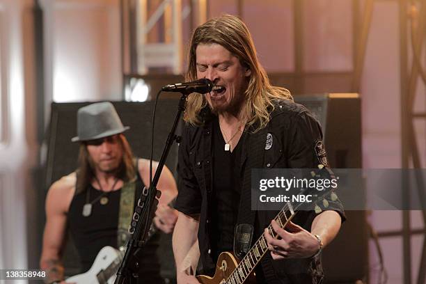 Episode 3794 -- Pictured: Musical guests Puddle of Mudd perform on March 25, 2010