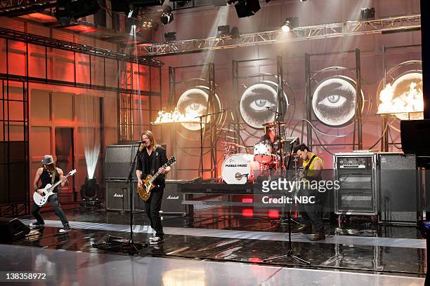 Episode 3794 -- Pictured: Musical guests Puddle of Mudd perform on March 25, 2010
