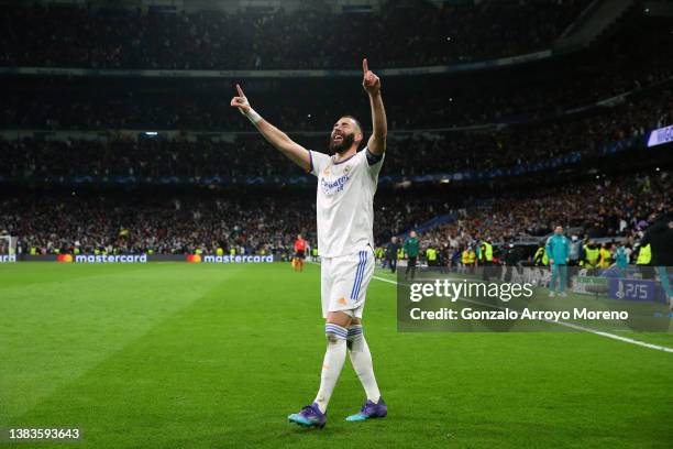 Karim Benzema of Real Madrid celebrates after scoring their team's third goal and his hat-trick during the UEFA Champions League Round Of Sixteen Leg...