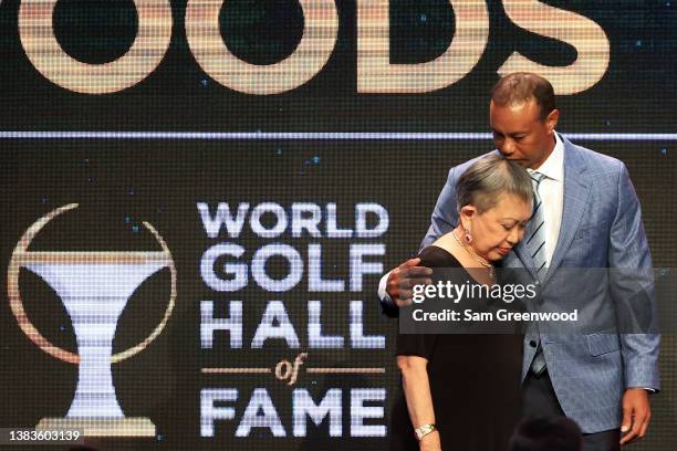 Tiger Woods and his mother Kultida Woods react as they pose for photos prior to his induction at the 2022 World Golf Hall of Fame Induction at the...