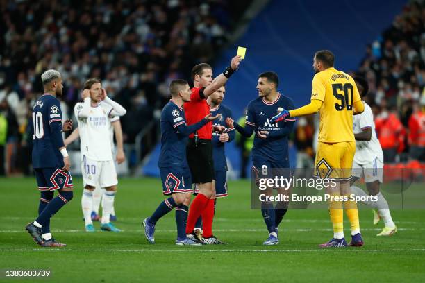 Gianluigi Donnarumma of PSG see the yellow card during the UEFA Champions League, round of 16 - second leg, football match played between Real Madrid...