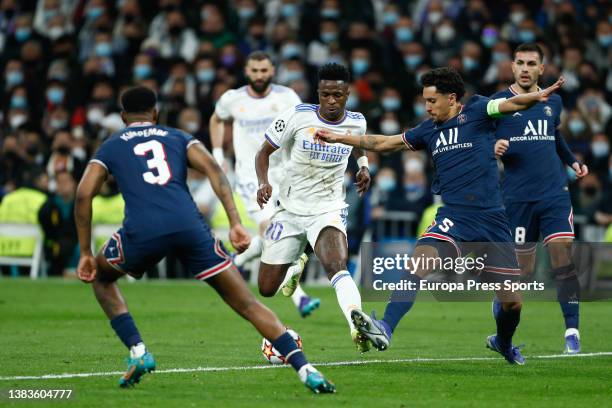 Vinicius Junior of Real Madrid and Marcos "Marquinhos" Aoas of PSG in action during the UEFA Champions League, round of 16 - second leg, football...