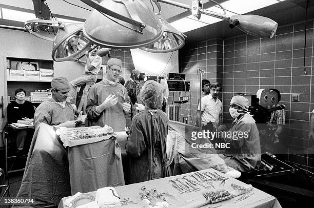 Dog Day Hospital" Episode 18 -- Pictured: William Daniels as Dr. Mark Craig, Ed Begley Jr. As Dr. Victor Ehrlich, director Victor Lobl, Kavi Raz as...