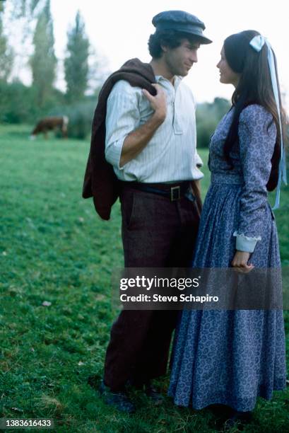 View of actors Paul Michael Glaser and Michele Marsh in costume on the set of the film 'Fiddler on the Roof' , 1970. The film was released the...