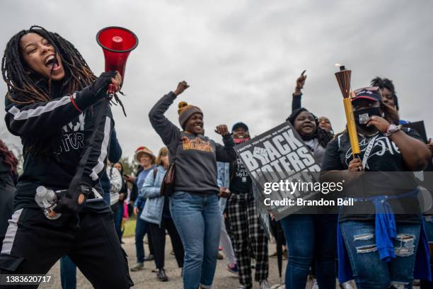 Marchers dance during the Black Voters Matter's 57th Selma to Montgomery march on March 09, 2022 in Selma, Alabama. People gathered alongside...