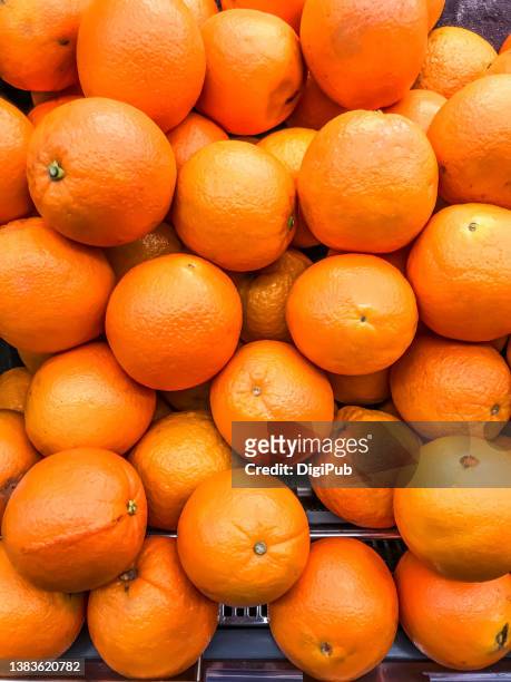 navel orange, produced in california - navel orange stockfoto's en -beelden